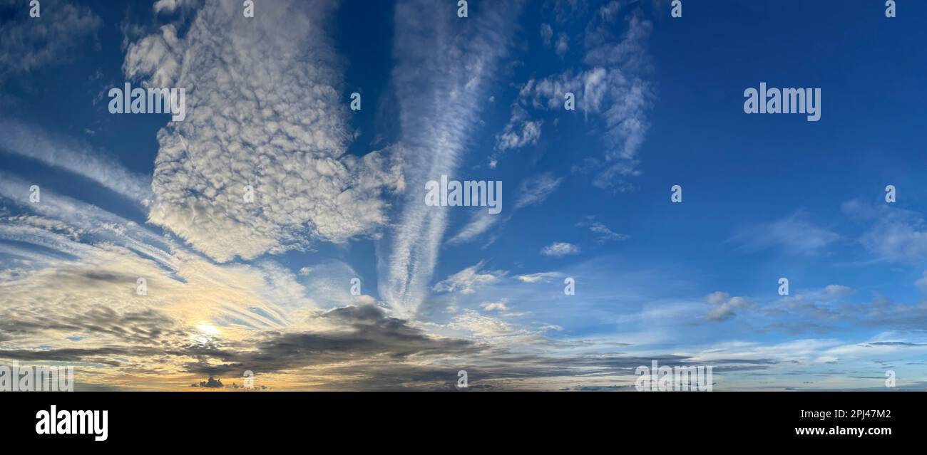 Dawn. Morning sun, white clouds and blue sky panoramic background Stock ...
