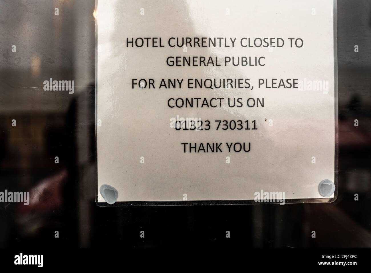 Notice on the door of a Home office run hotel for asylum seekers. East