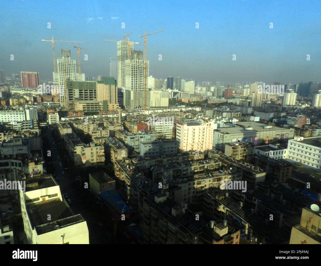 People's Republic of China, Yunnan Province, Kunming:  view of the city from the revolving restaurant of the Jin Jiang Hotel. Stock Photo