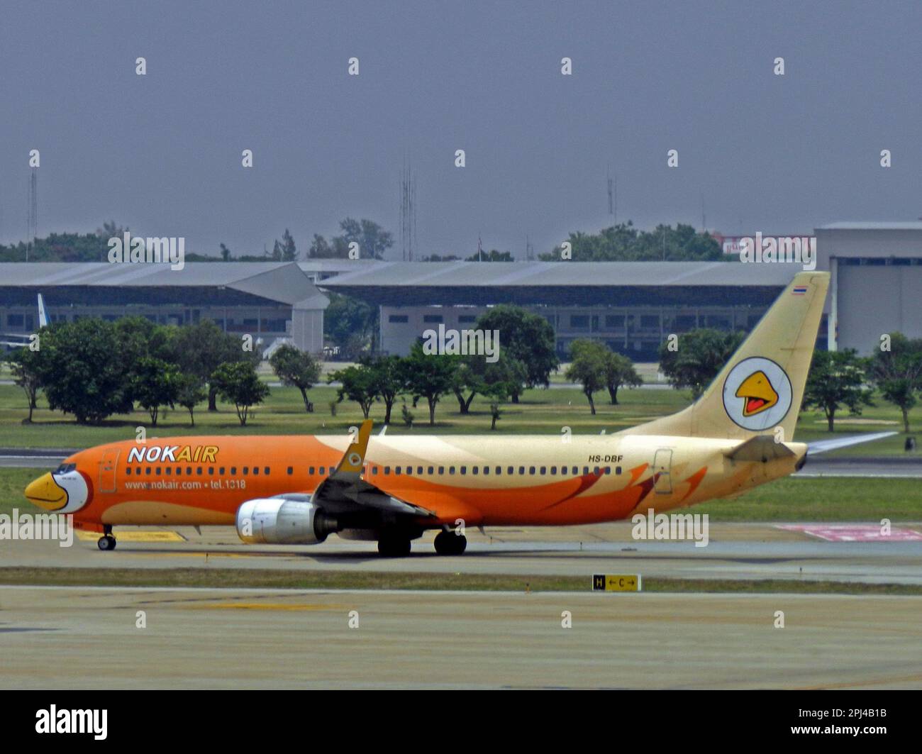 Thailand, Bangkok:  HS-DBF  Boeing 737-8V3 (c/n 29670) of Nok Air at Don Mueang Airport. Stock Photo