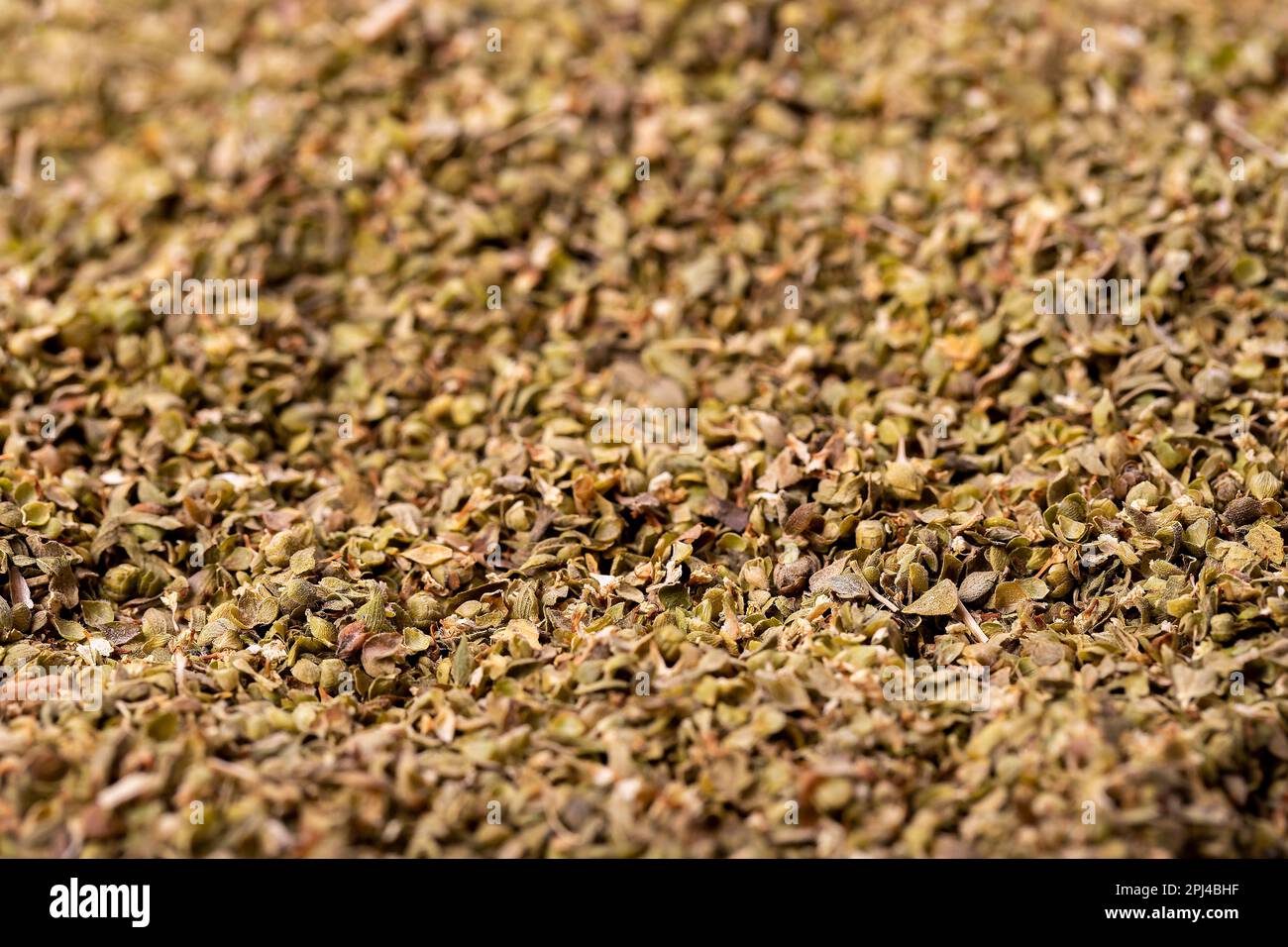 Thyme spice. Bulk dry thyme leaves food background. Spice concept Stock