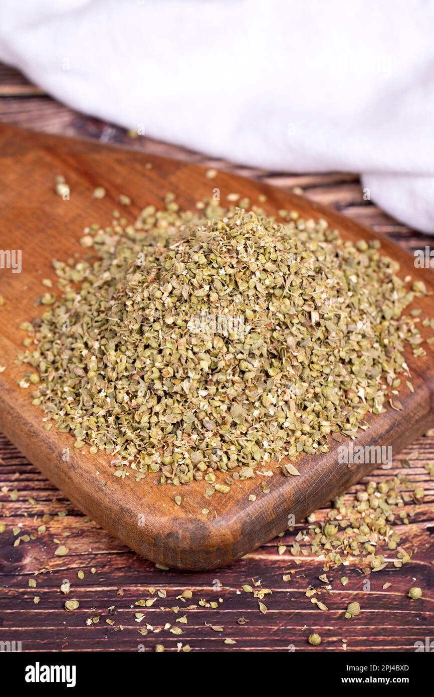 Thyme spice. Wood serving board Dried Thyme leaf. Spice concept Stock