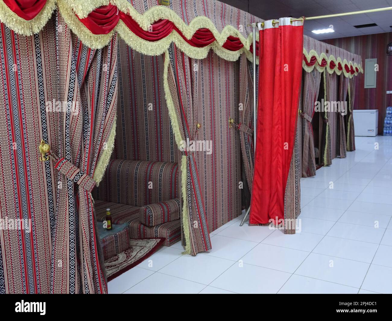 Oman, Taqah private dining cubicles in a restaurant, as frequently used by Omani family groups