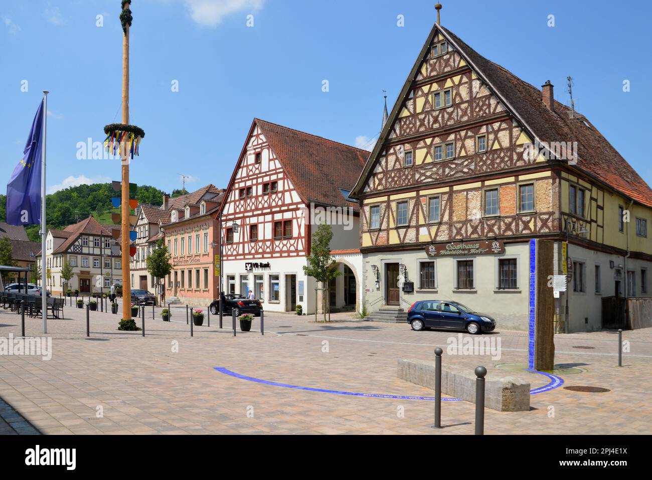 Germany, Bavaria, Unterfranken, Röttingen:  marketplace with maypole and timber-frame houses Stock Photo