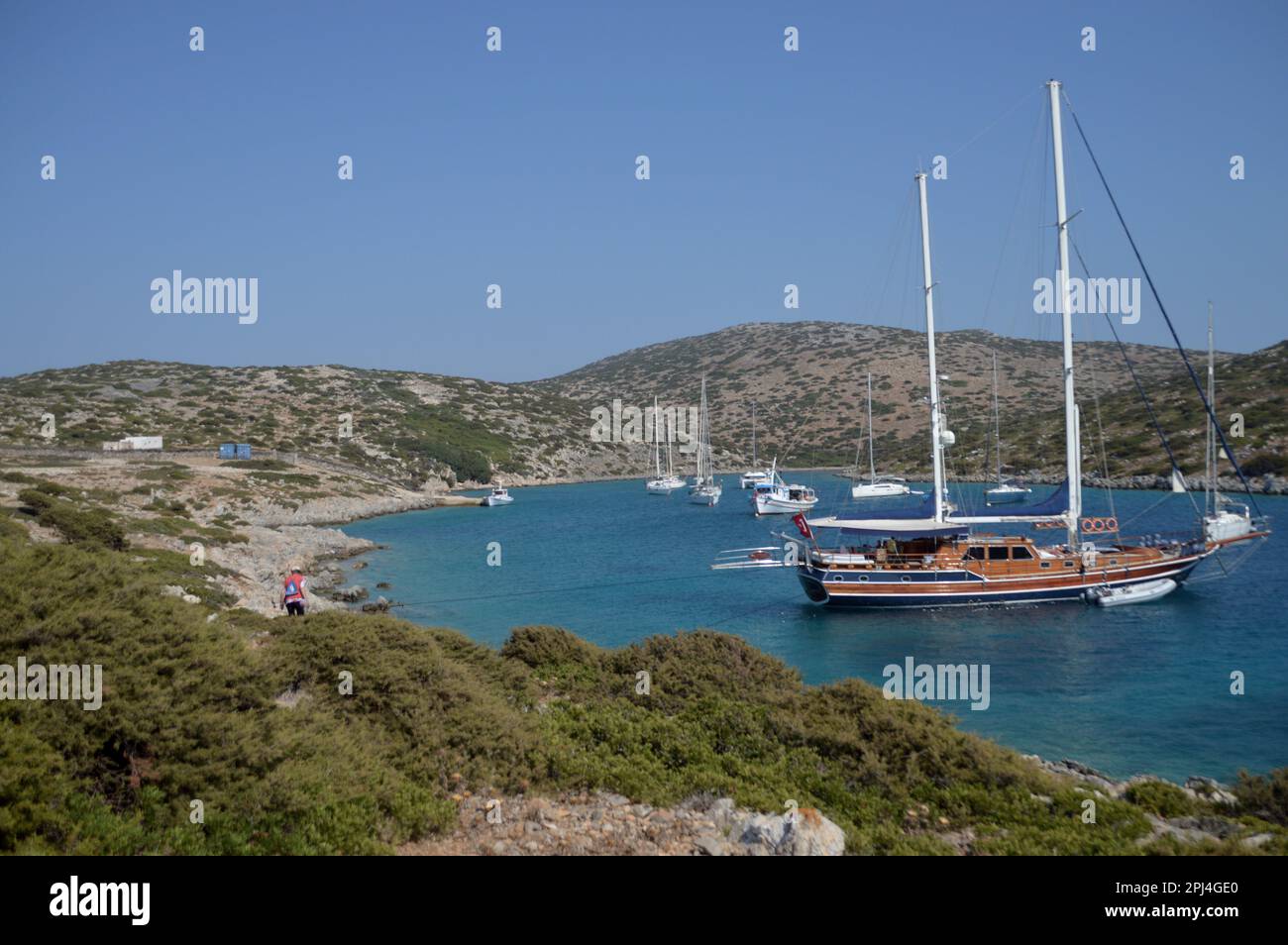 Greece, Island of Levitha (population 10):   a sheltered bay provides refuge for small craft from the Meltemi wind. Stock Photo