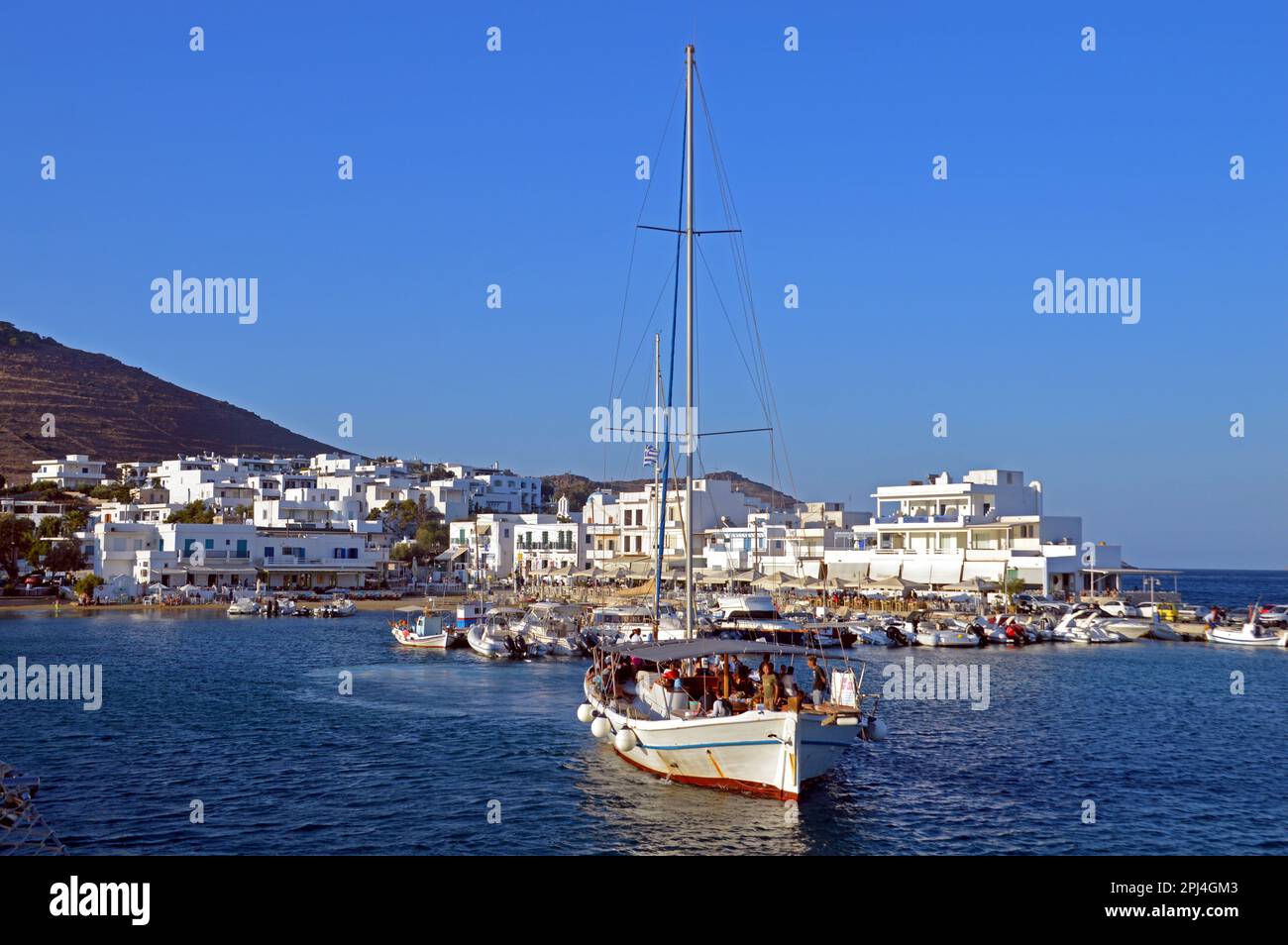 Greece, Island of Paros sailing ship returning from a day trip at Piso