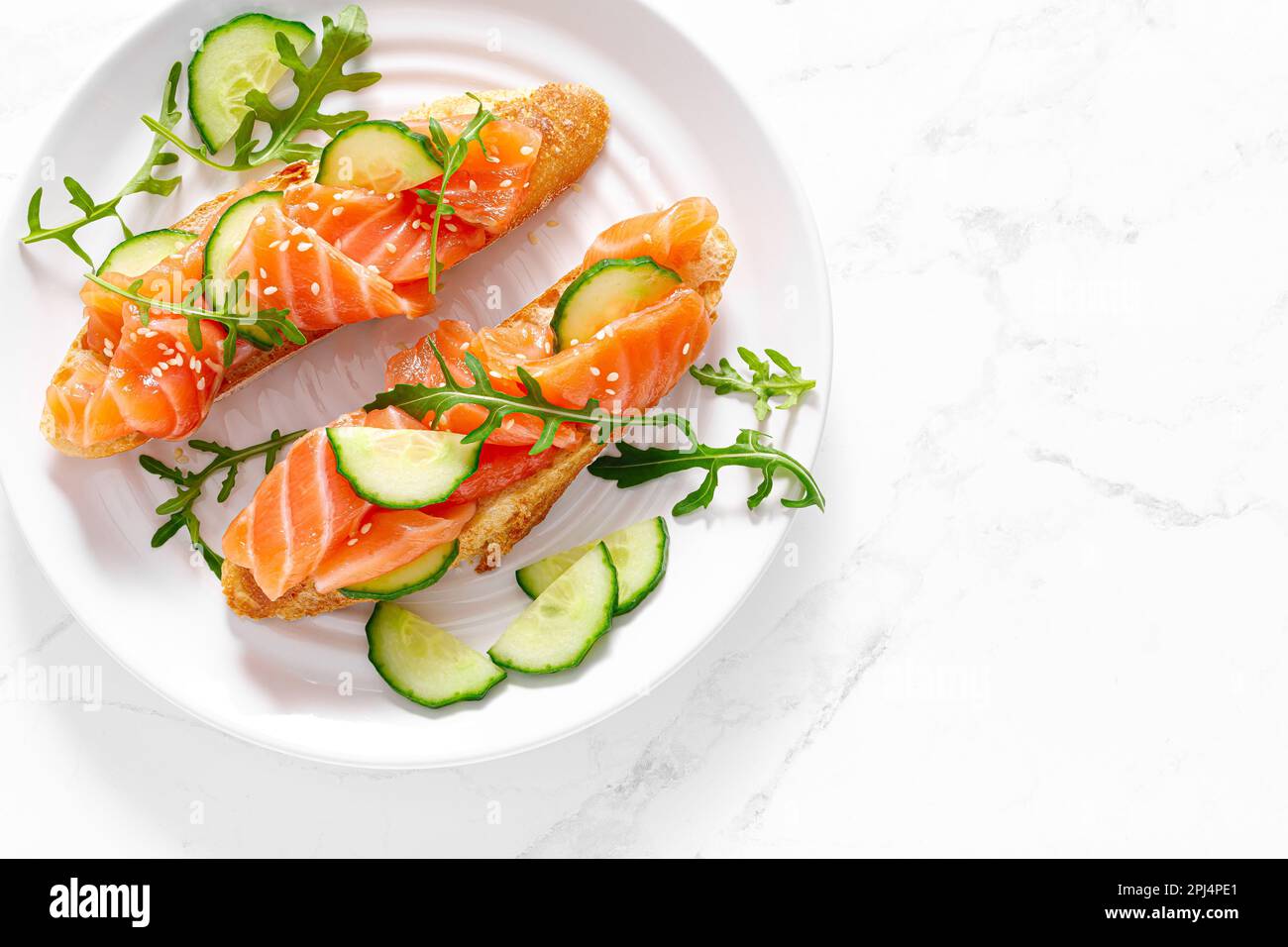 Sandwiches with salted salmon. Healthy food, breakfast. Top view Stock Photo