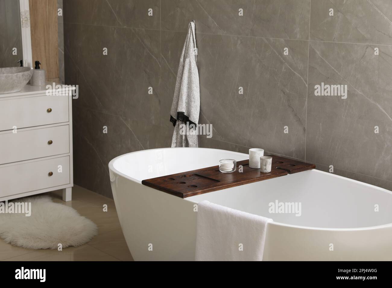 Modern white tub in bathroom. Interior design Stock Photo - Alamy