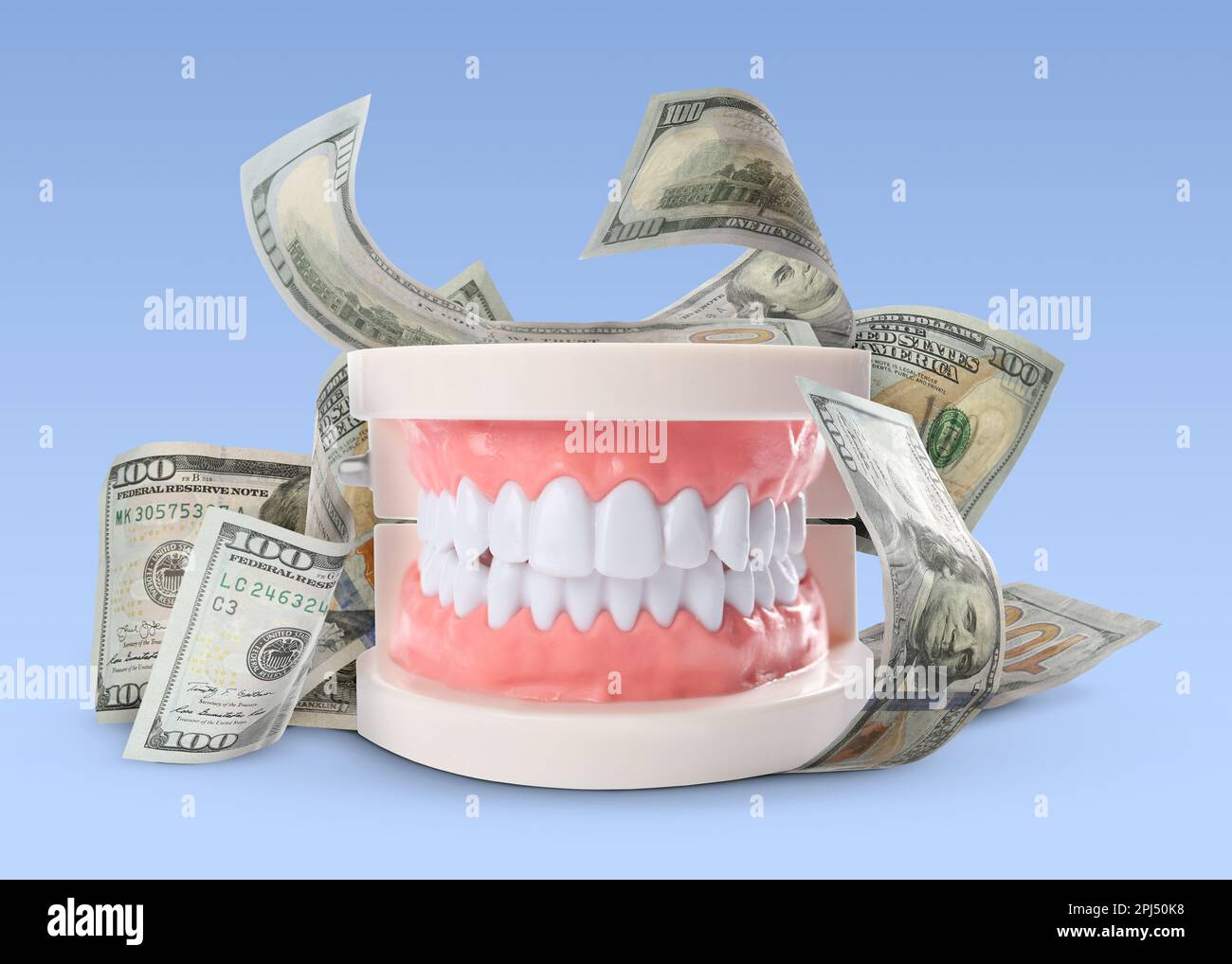 Model of oral cavity with teeth and dollar banknotes on light blue