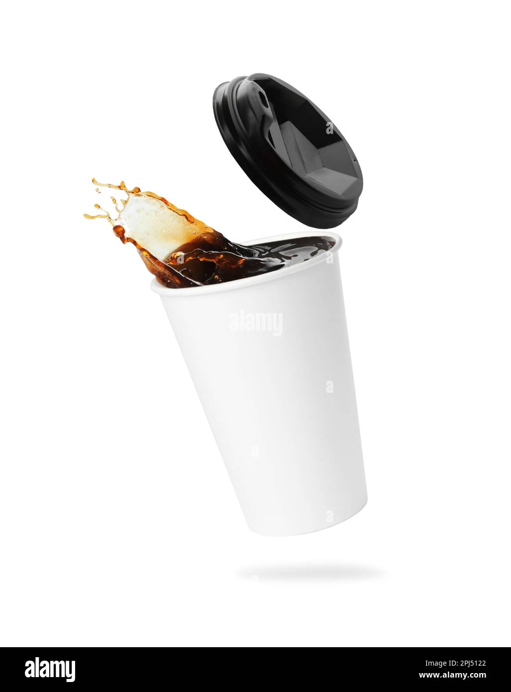 Takeaway paper cup with splashing coffee and plastic lid on white ...