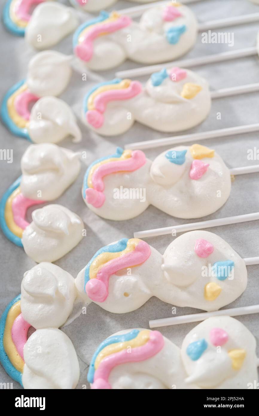 Unicorn meringue pops Stock Photo Alamy