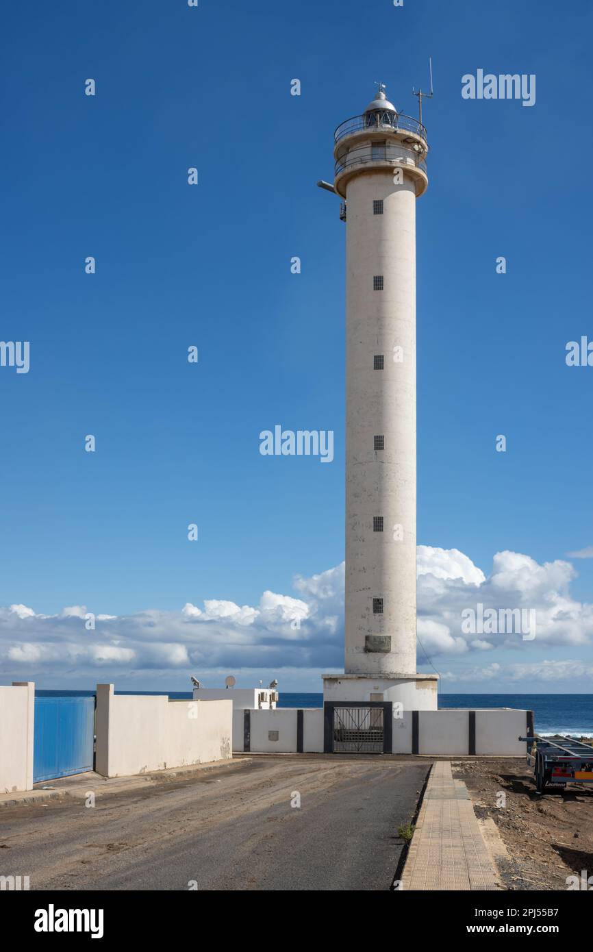 Lighthouse in an industrial zone of the capital city. Tall white