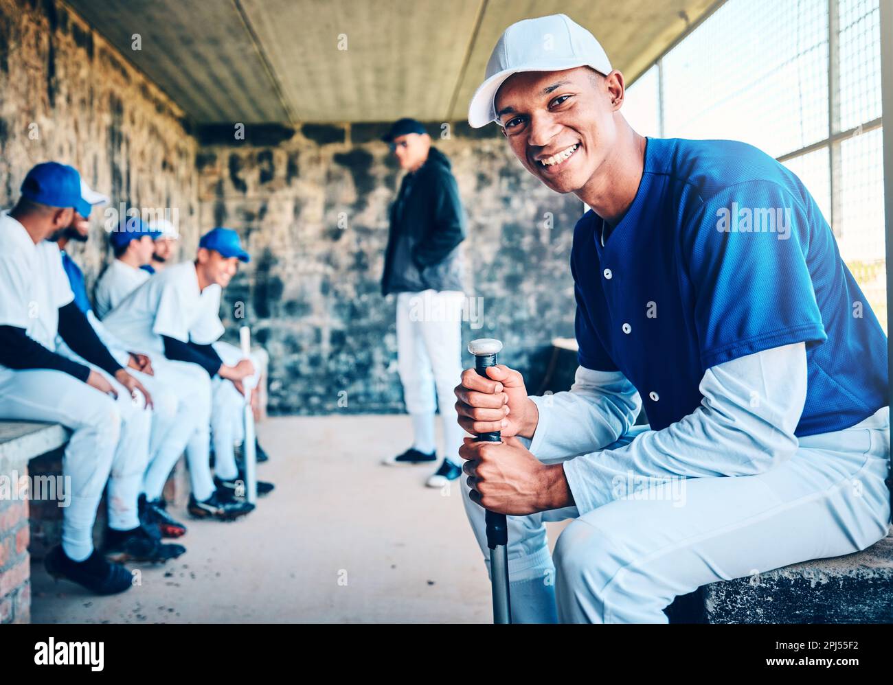 Baseball player, dugout and portrait of a black man with sports team and smile in stadium