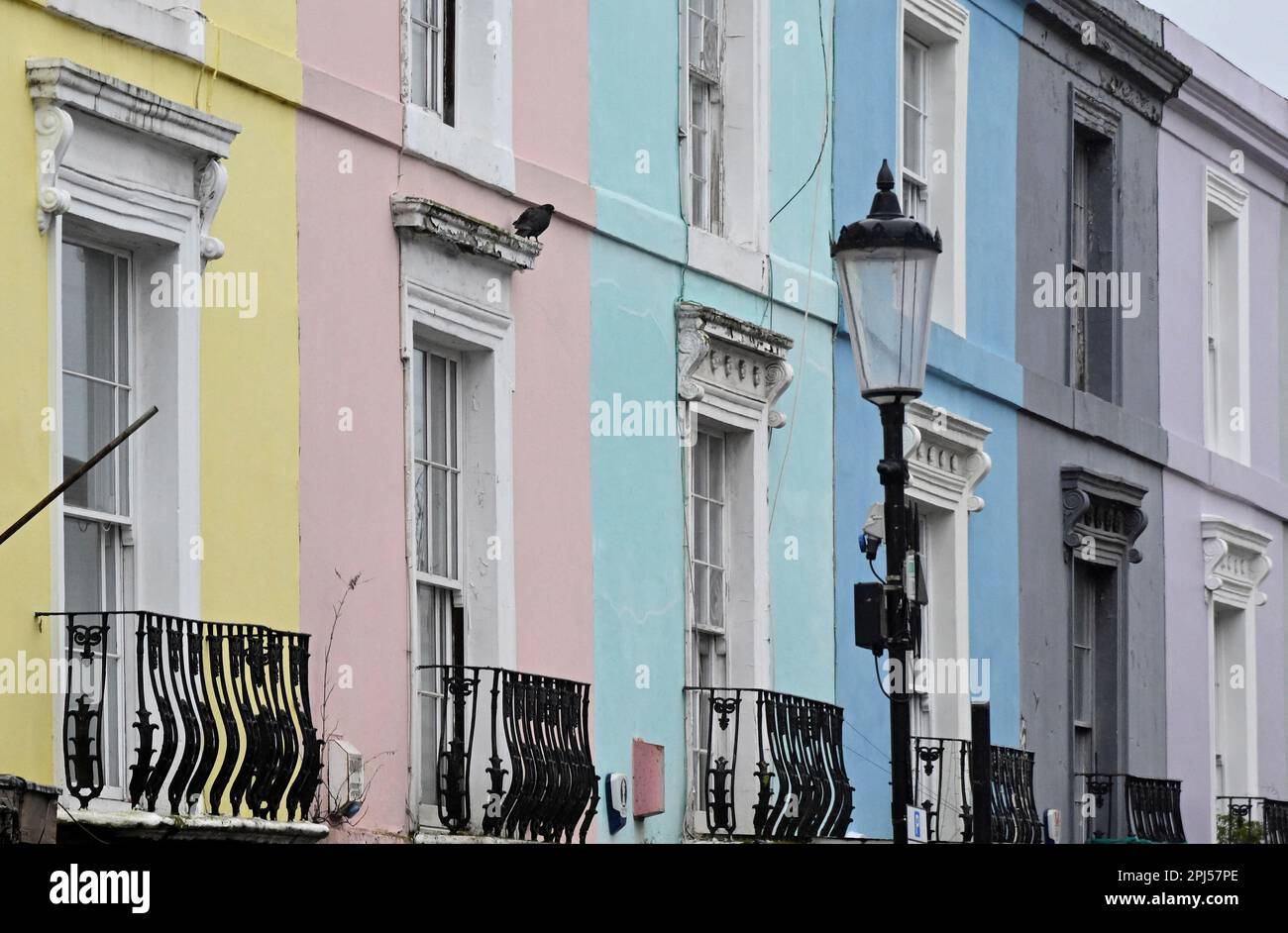 Painted houses are seen in London, Britain, March 31, 2023. REUTERS
