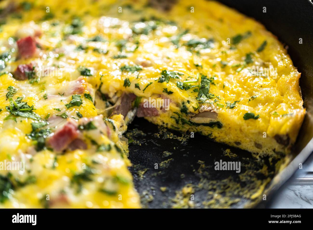 Spinach and ham frittata Stock Photo - Alamy