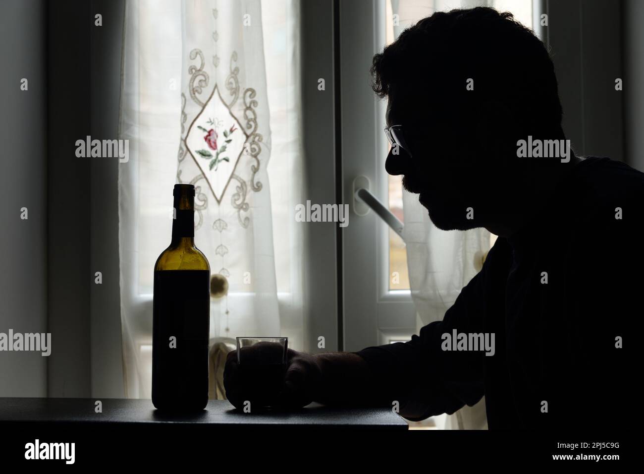 alcoholism - addiction - drunk - drinking wine Stock Photo