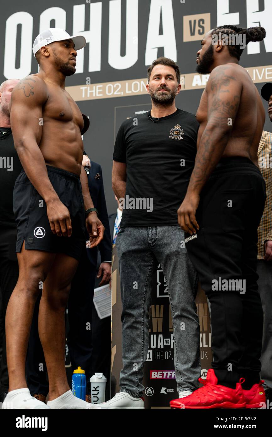 Boxing Promoter Eddie Hearn Stands In The Centre As Anthony Joshua And ...