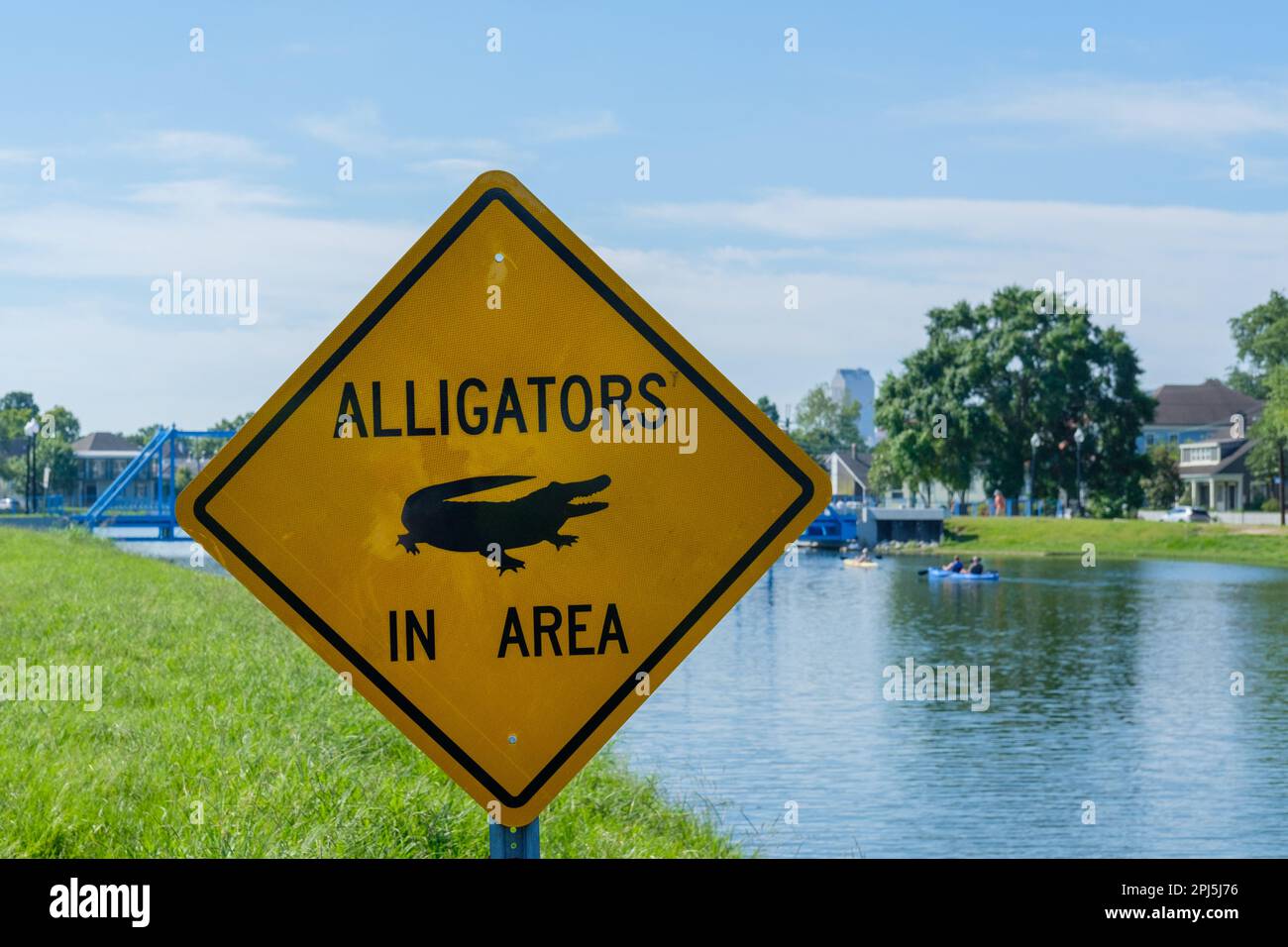 Alligators in Area sign on Bayou St. John in New Orleans, Louisiana