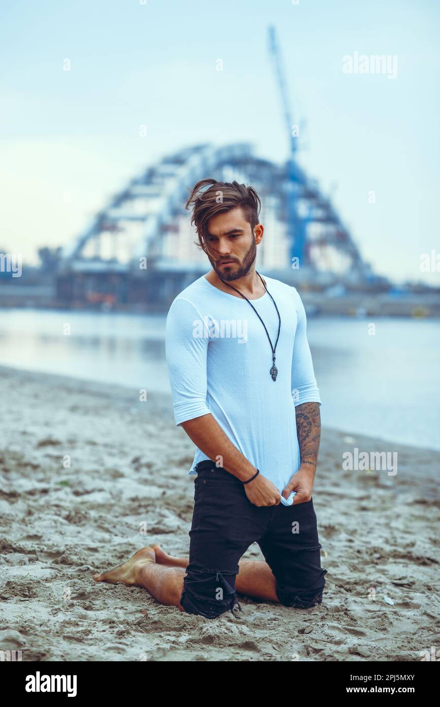 Man kneeling by river hi-res stock photography and images - Alamy