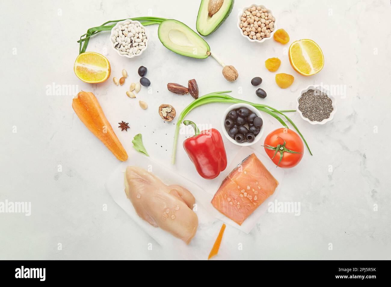 Healthy FODMAP diet food in heart shape. Organic fruits, vegetables