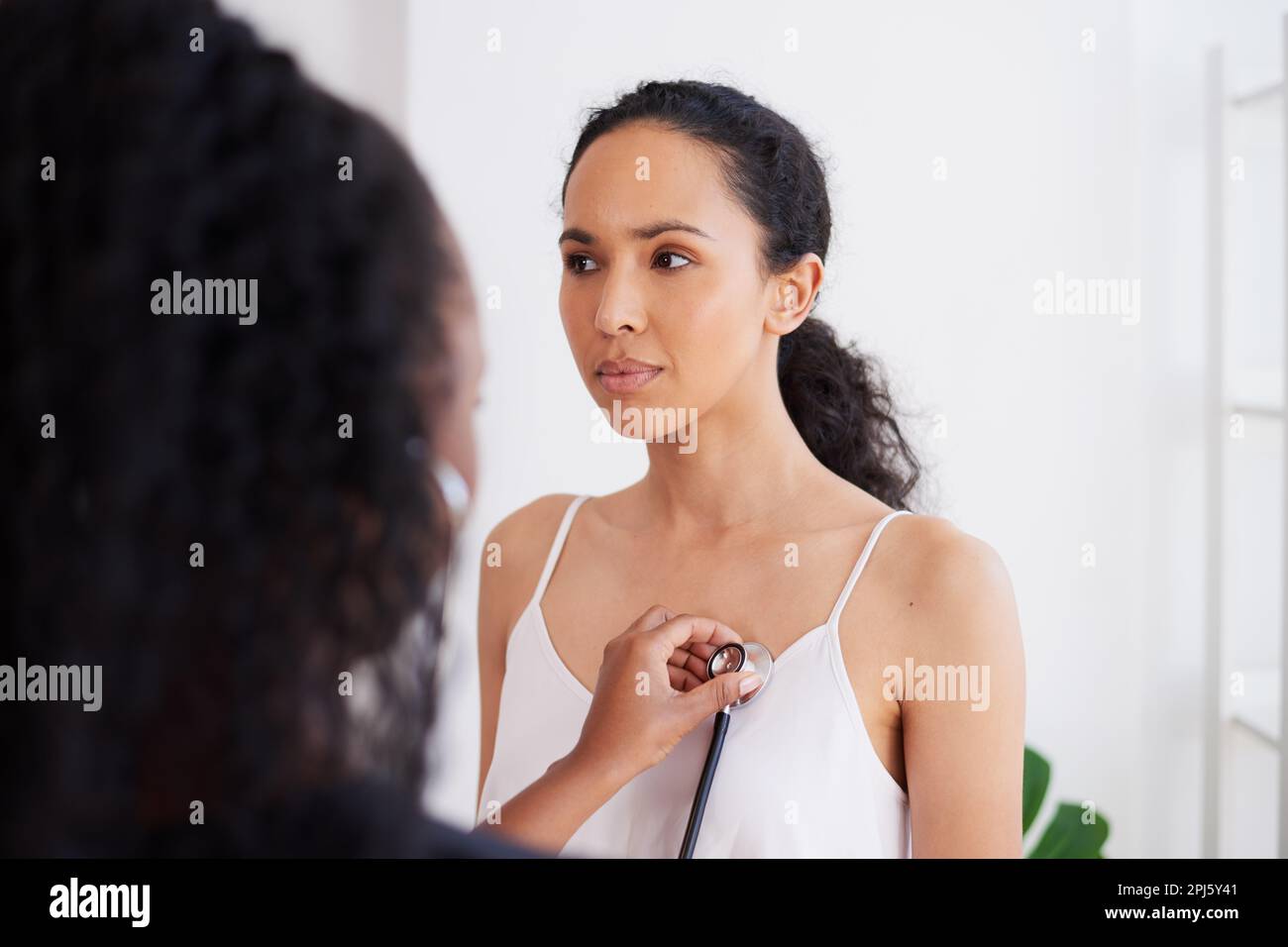 Black doctor over the shoulder hi-res stock photography and images - Alamy