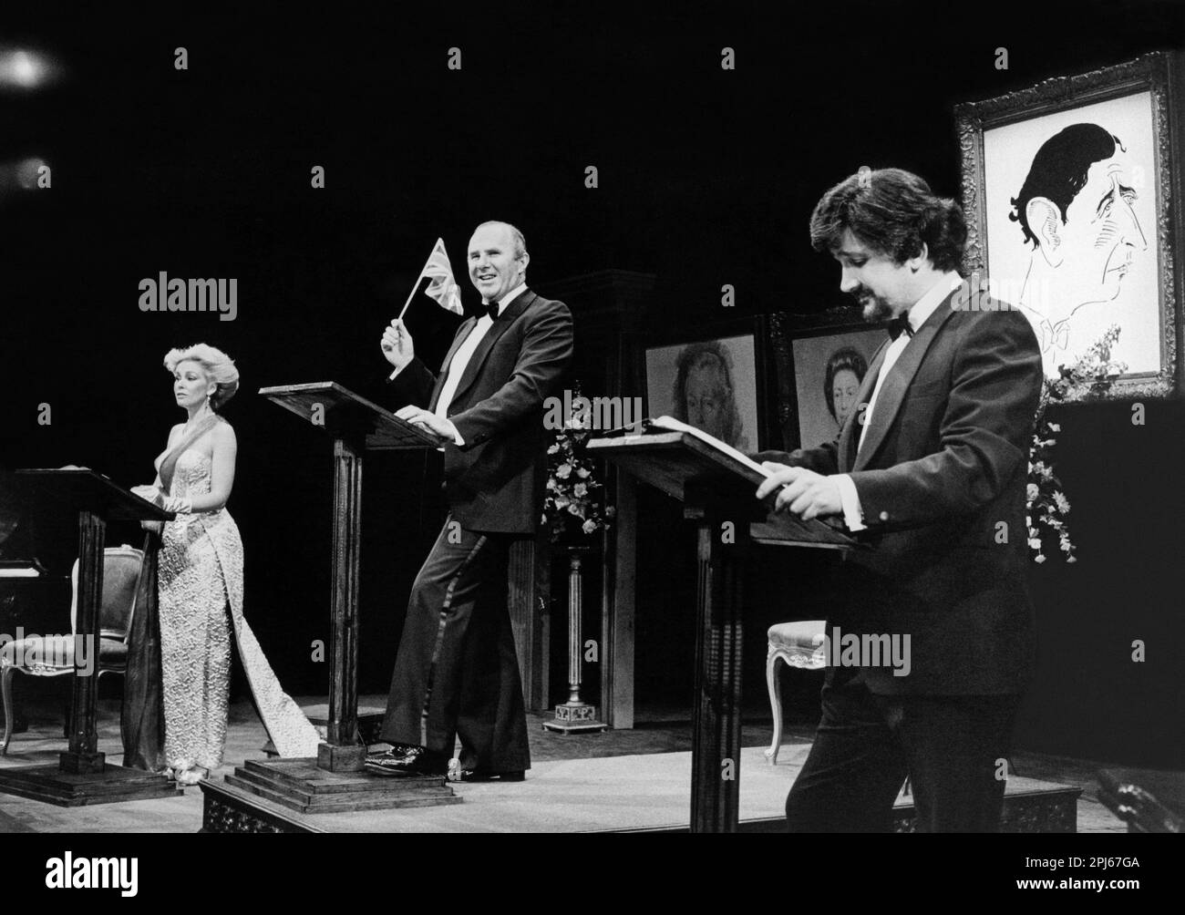 l-r: Pamela Stephenson, Clive James, Russell Davies in CHARLES CHARMING’S CHALLENGES ON THE PATHWAY TO THE THRONE by Clive James at the Apollo Theatre, London W1  10/06/1981  design: Roger Glossop  director: Kerry Crabbe Stock Photo