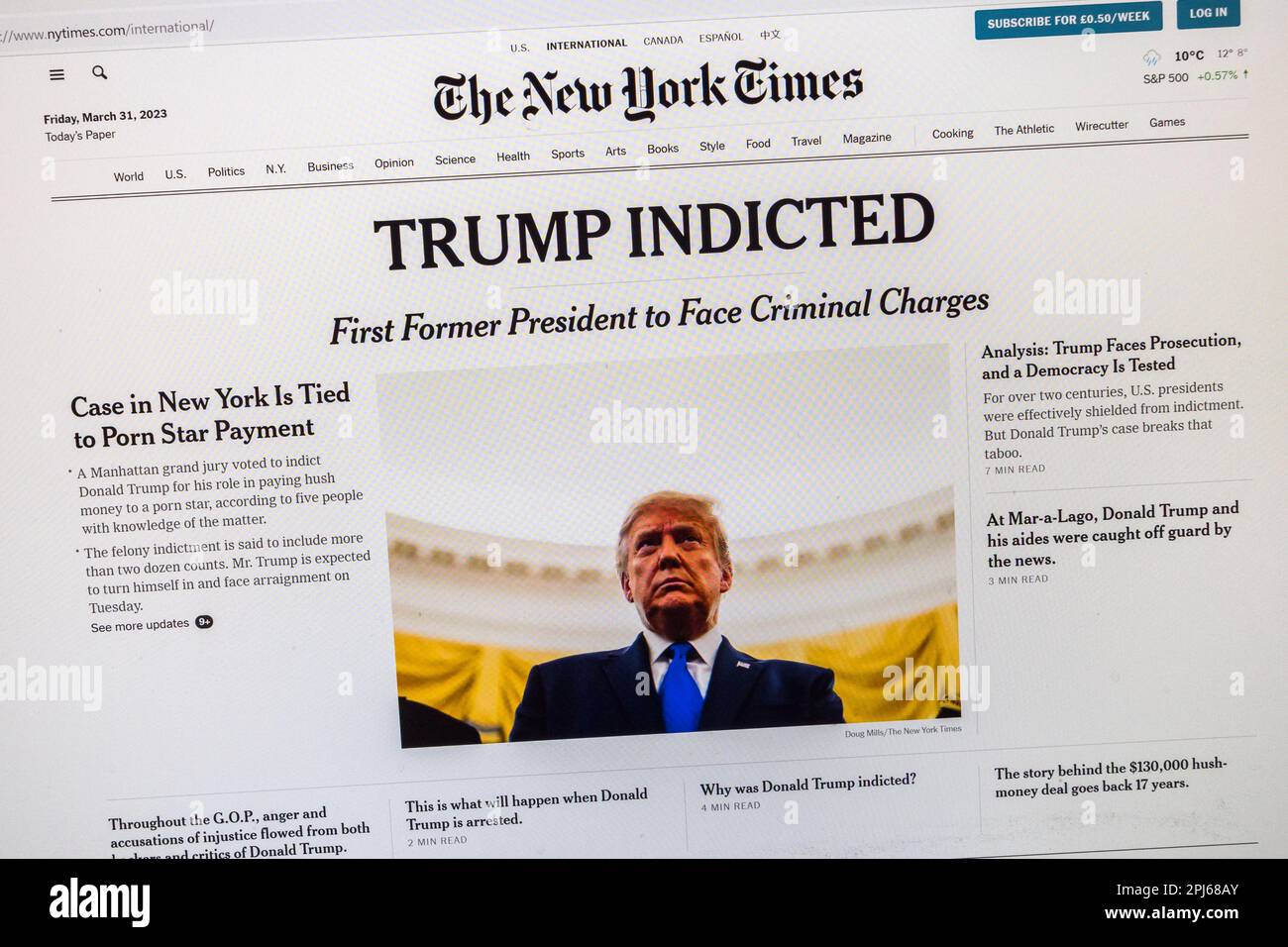 'Trump Indicted' headline on The New York Times website with breaking news of the indictment of Fm President Donald Trump, 31st March 2023. Stock Photo