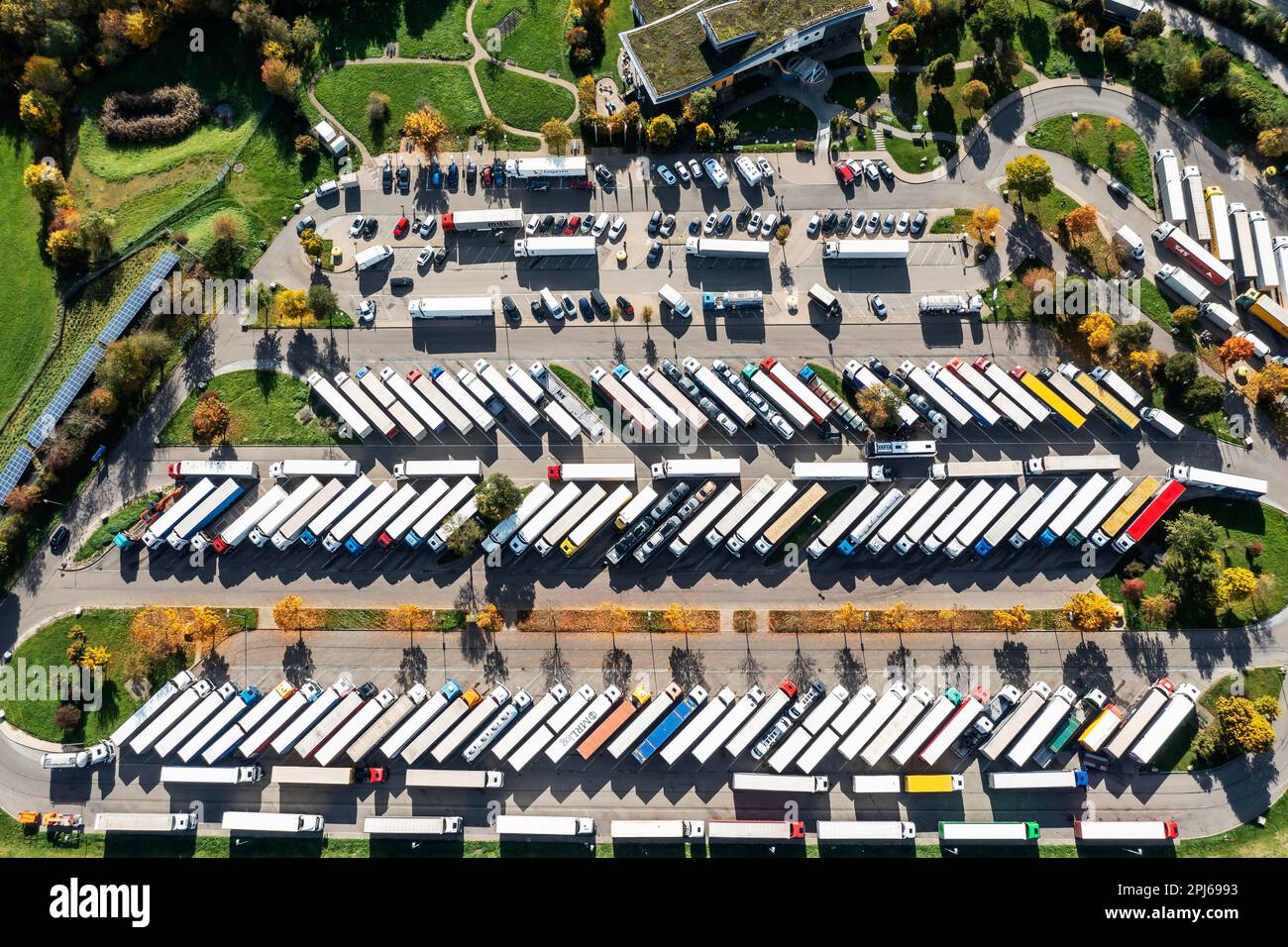 Overcrowded lorry parking spaces at the Gruibingen service area on the A8 motorway, rest time driver, Gruibingen, Baden-Wuerttemberg, Germany Stock Photo