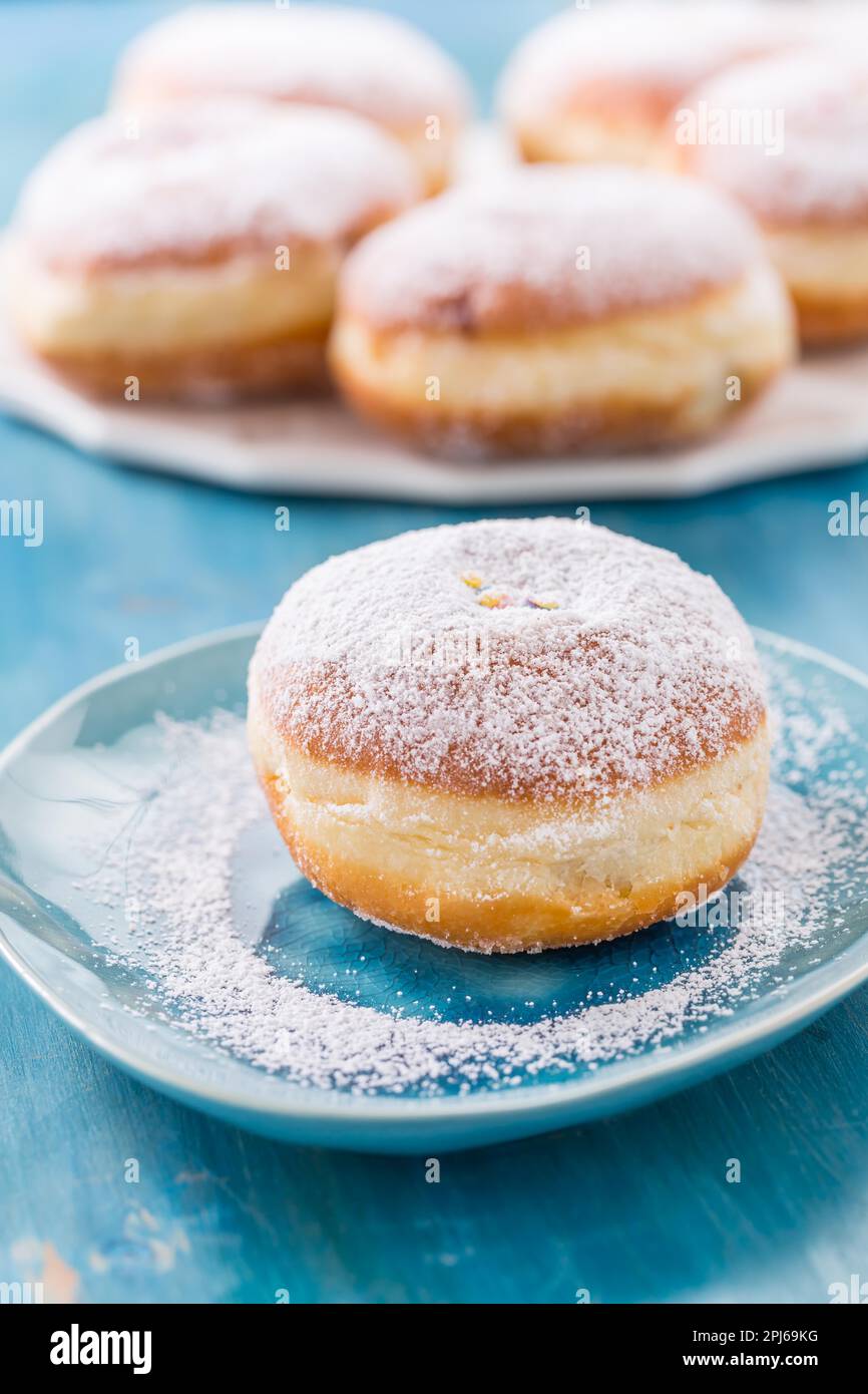 Traditional German Krapfen, Berliner or donuts with icing sugar Stock