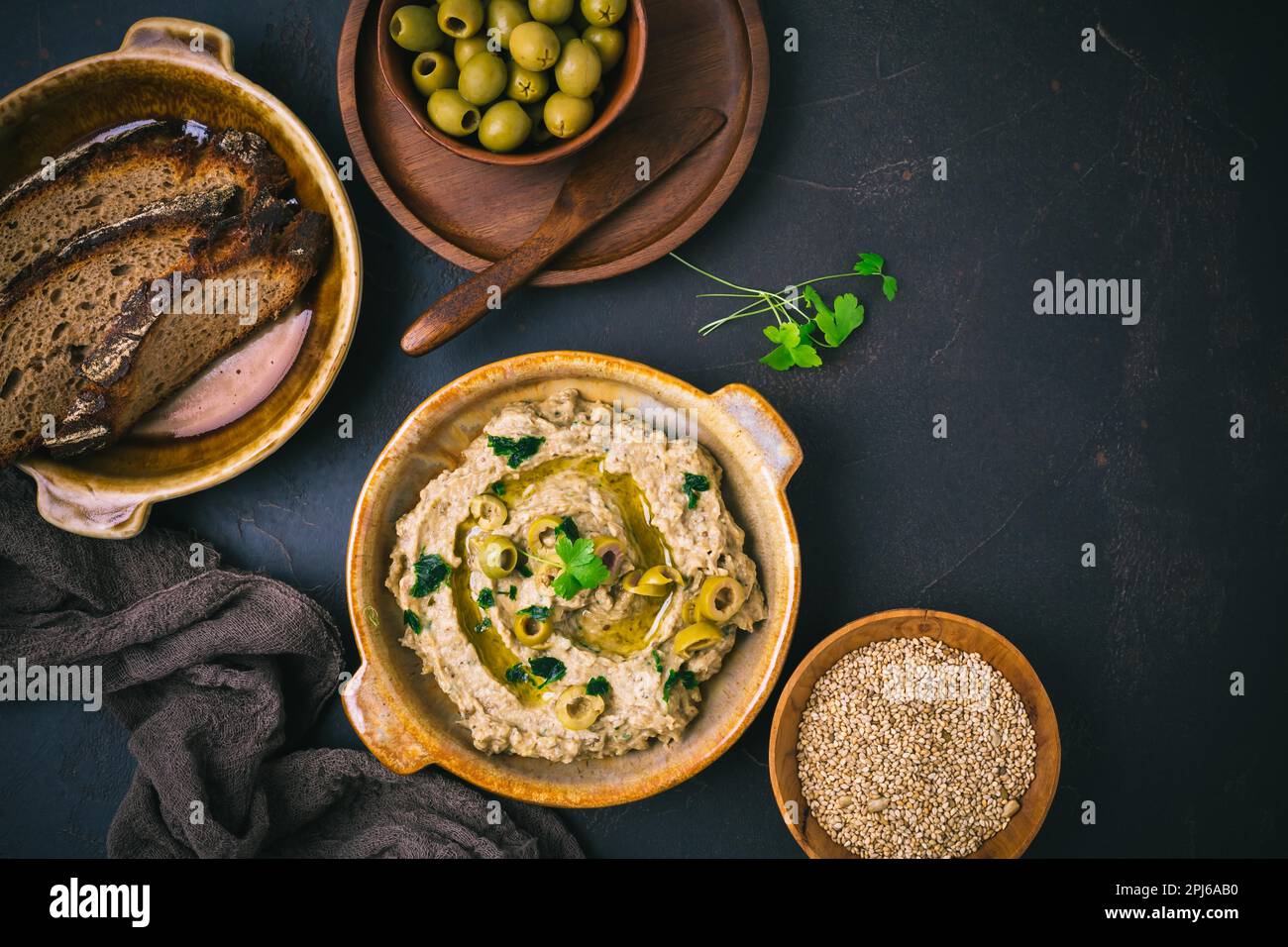 Arabic food Aubergine paste or dip Baba Ghanoush with olives and