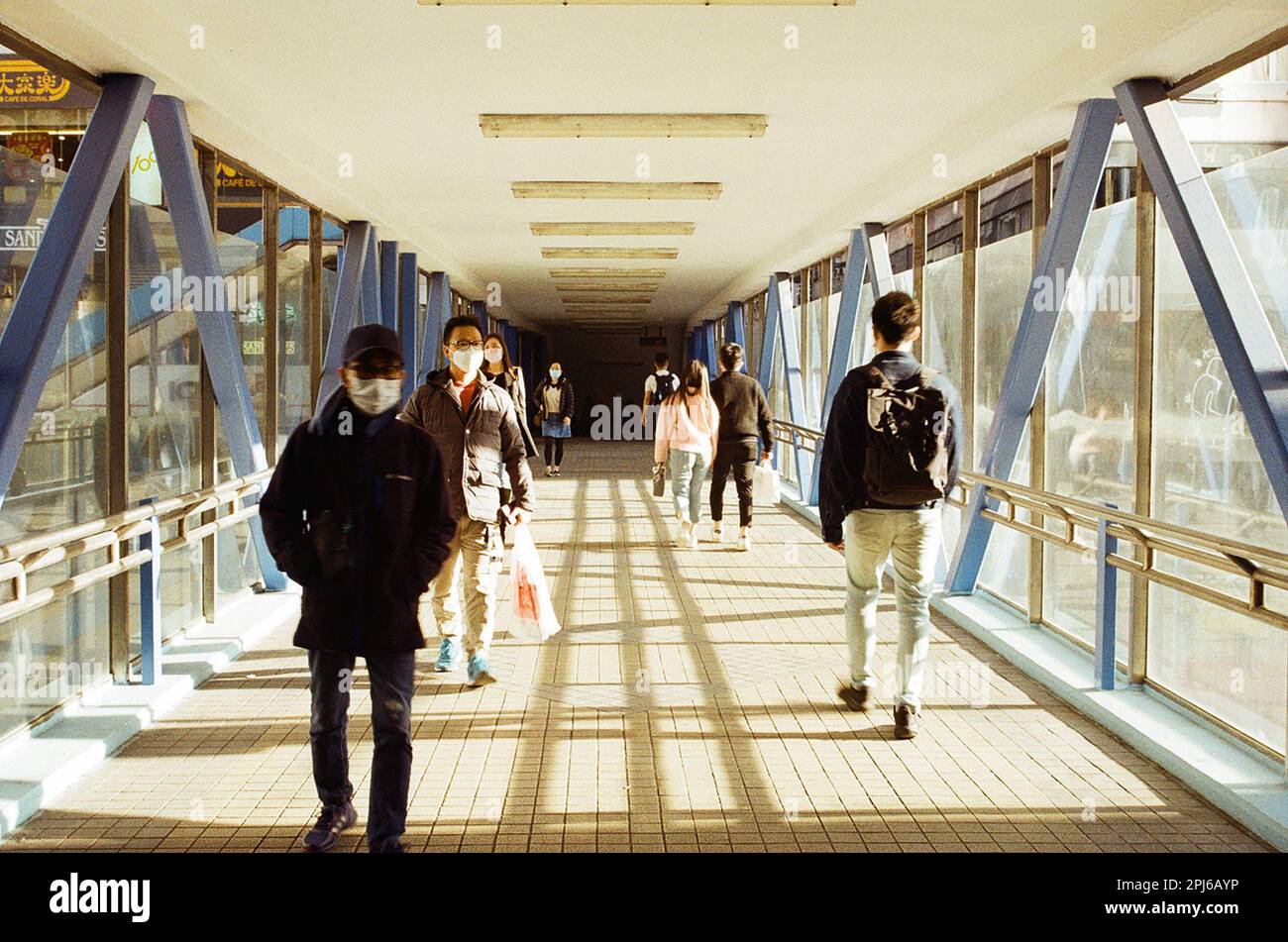 hong kong city people walking on bridge Stock Photo - Alamy