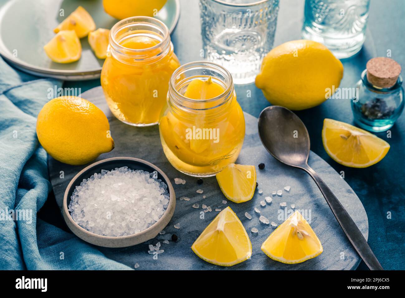 Preserved, salted canned lemons, lemon pickle. Moroccan cuisine Stock