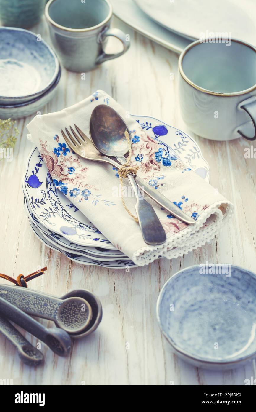 Sustainability concept - stoneware and kitchenware on wooden kitchen table Stock Photo
