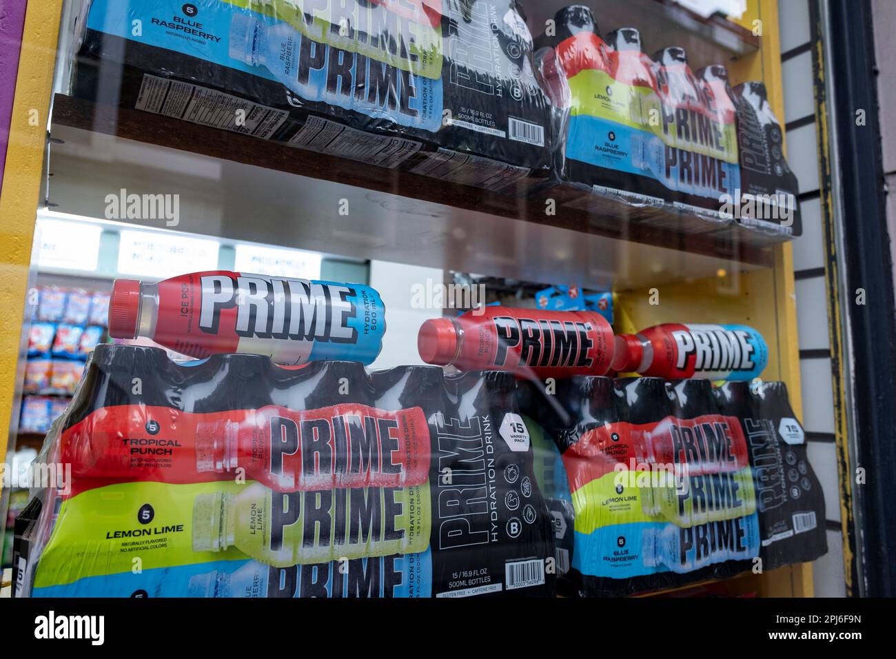 Various flavours of the energy drink Prime for sale in a shop window on 9th March 2023 in London