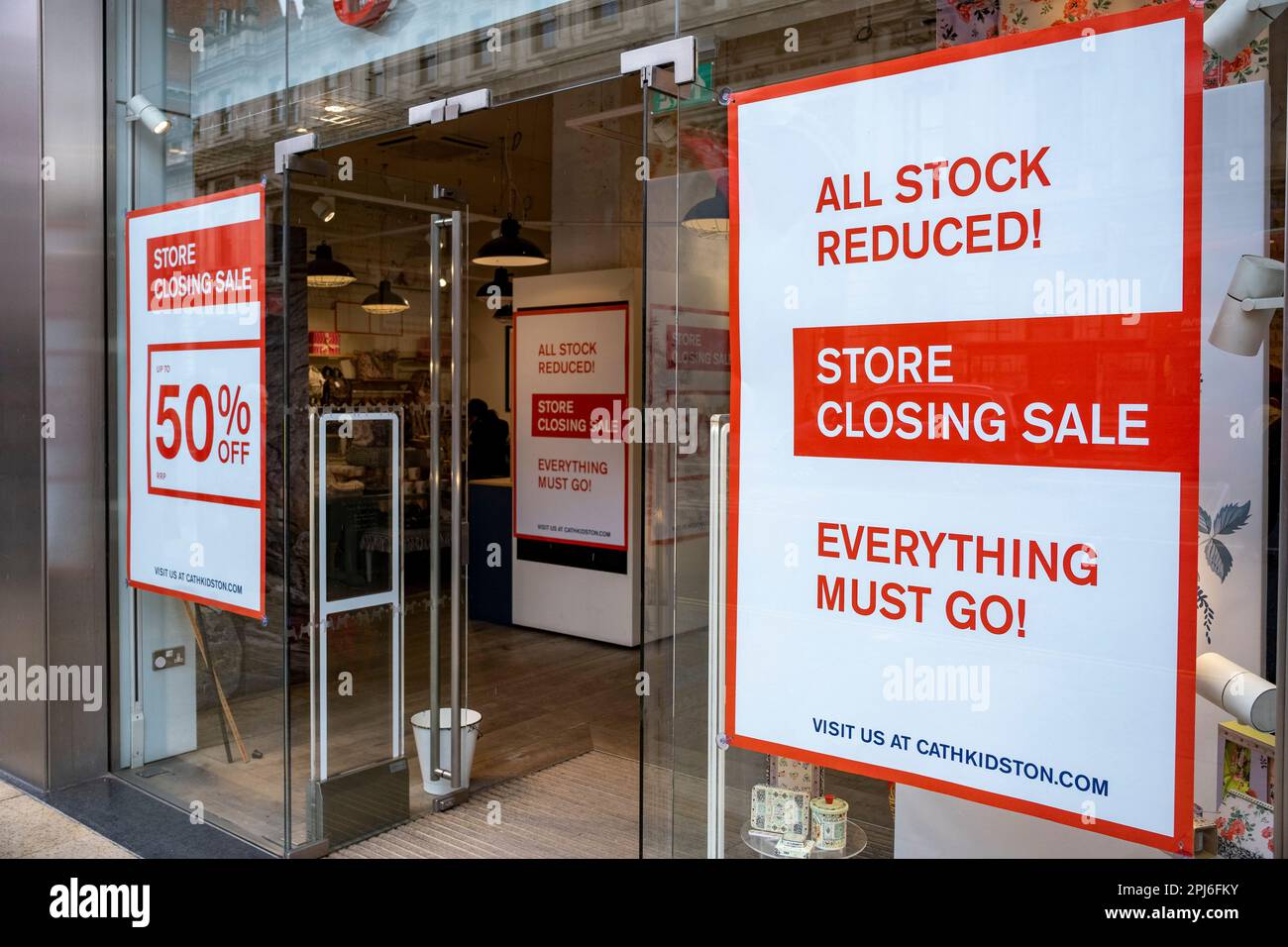 Store closing all stock reduced signs at the homeware retailer Cath
