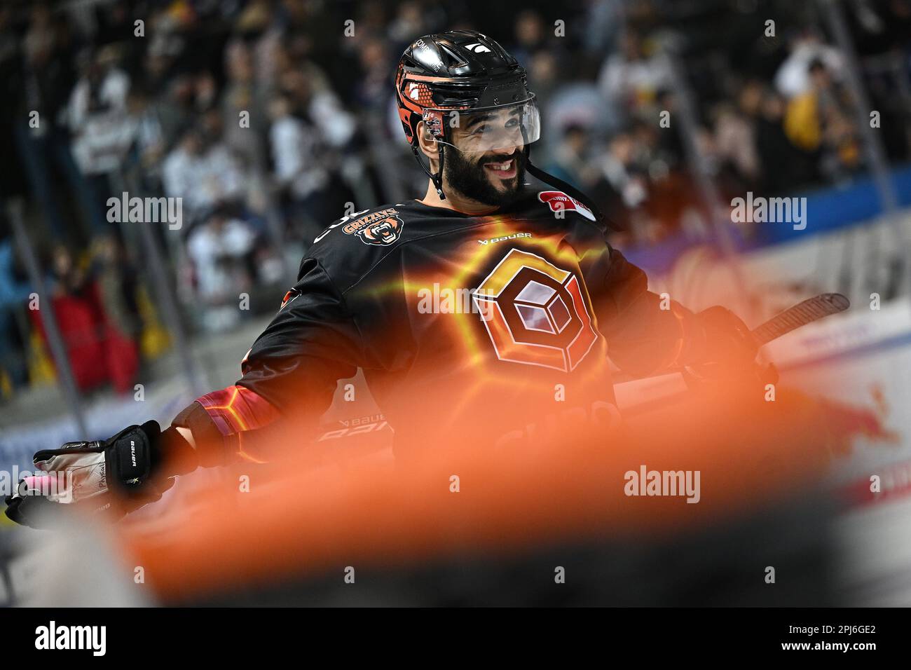 Munich, Germany. 31st Mar, 2023. Ice hockey: DEL, EHC Red Bull München -  Grizzlys Wolfsburg, championship round, semifinal, 1st game day,  Olympia-Eissportzentrum: Munich's Andreas Eder celebrates his goal to make  it 4:1.