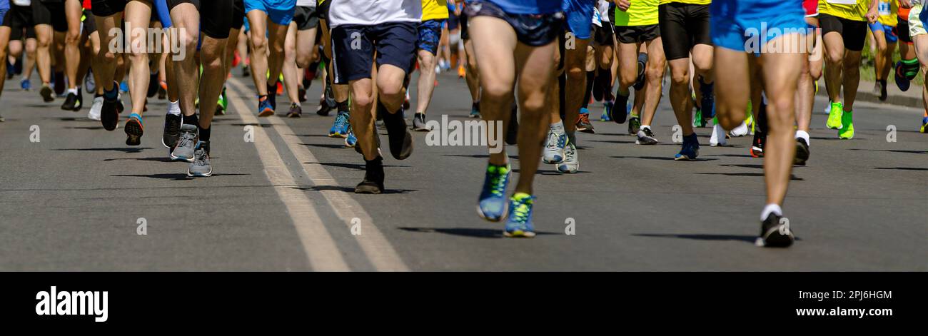 large group runners athletes running marathon, male jogging race of ...