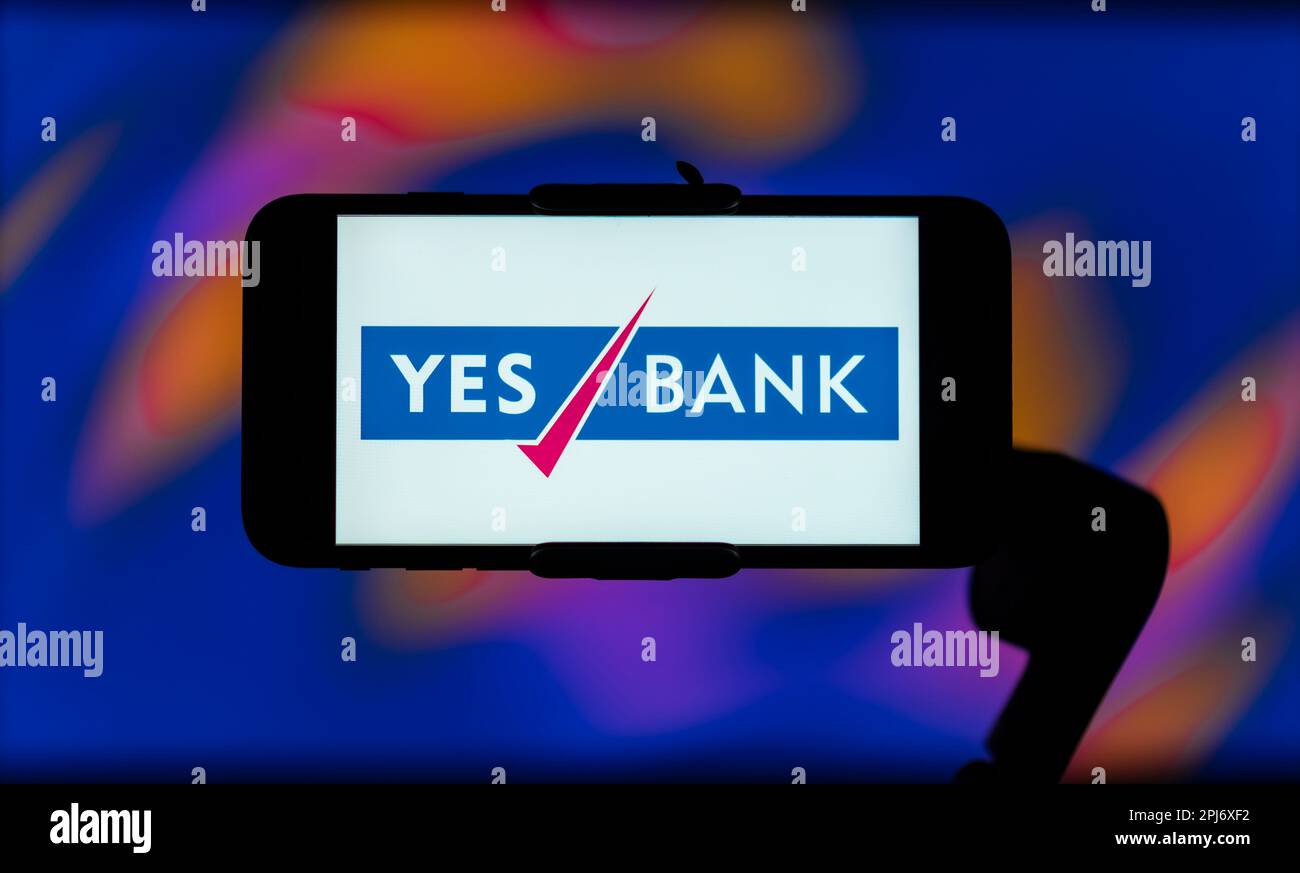 In this photo illustration, the Yes Bank logo is seen displayed on a ...
