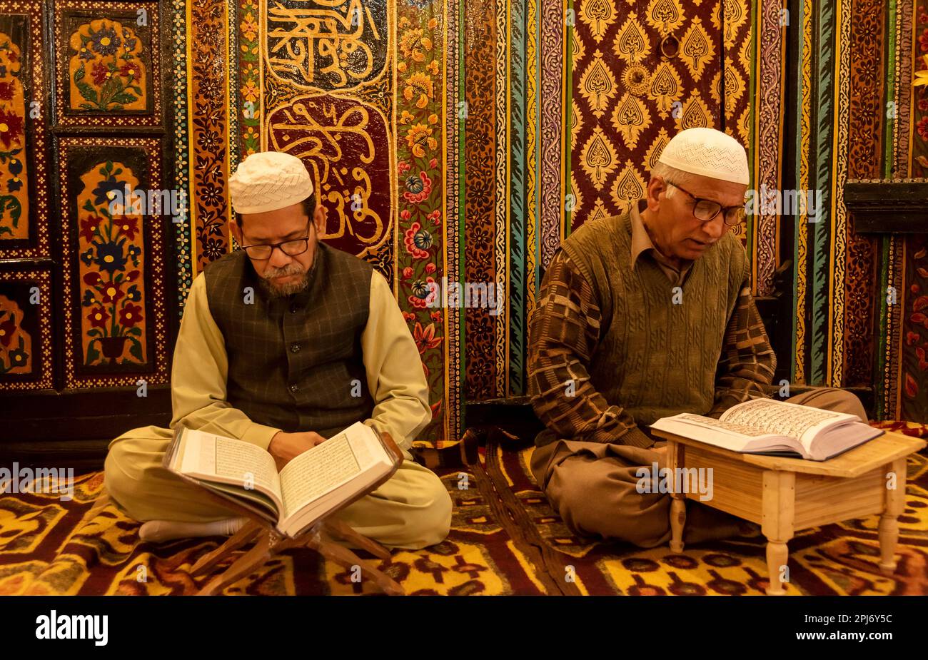 Kashmiri Muslims read from Islamic Holy book Quran inside a shrine on ...