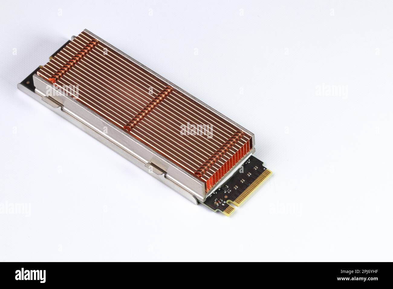 Solid state drives with copper heat sink for computer - ssd sata, NVME PCIe, SATA SSD m key, b key isolated on white background. Stock Photo