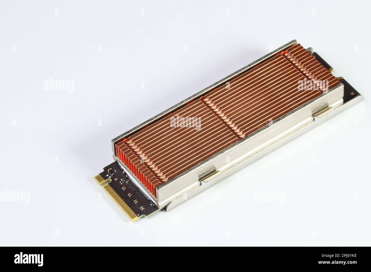 Solid state drives with copper heat sink for computer - ssd sata, NVME PCIe, SATA SSD m key, b key isolated on white background. Stock Photo