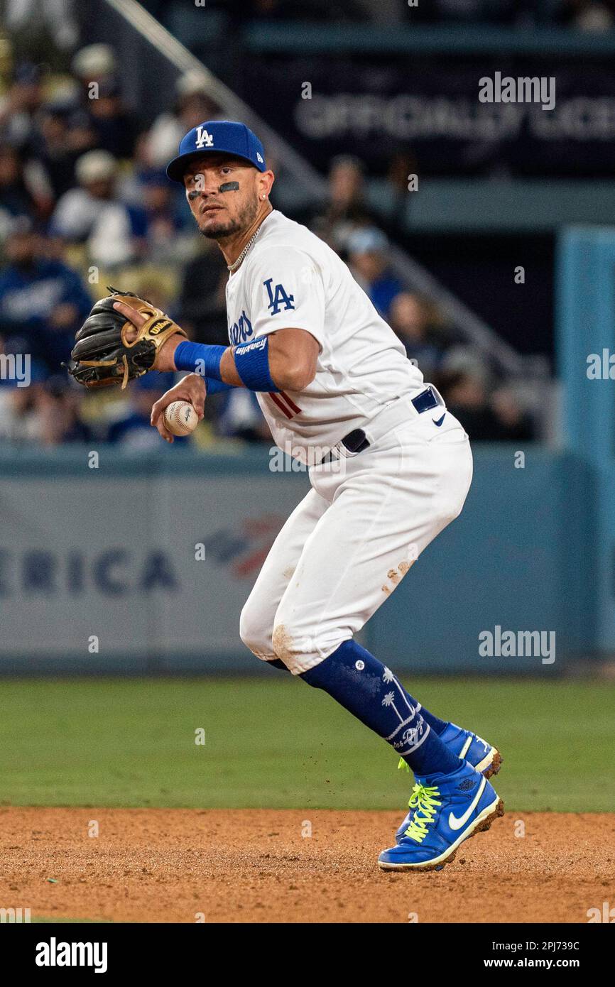 Los Angeles Dodgers shortstop Miguel Rojas (11) throws to firs for an out during a MLB game against the Arizona Diamondbacks, Wednesday, March 30, 202 Stock Photo
