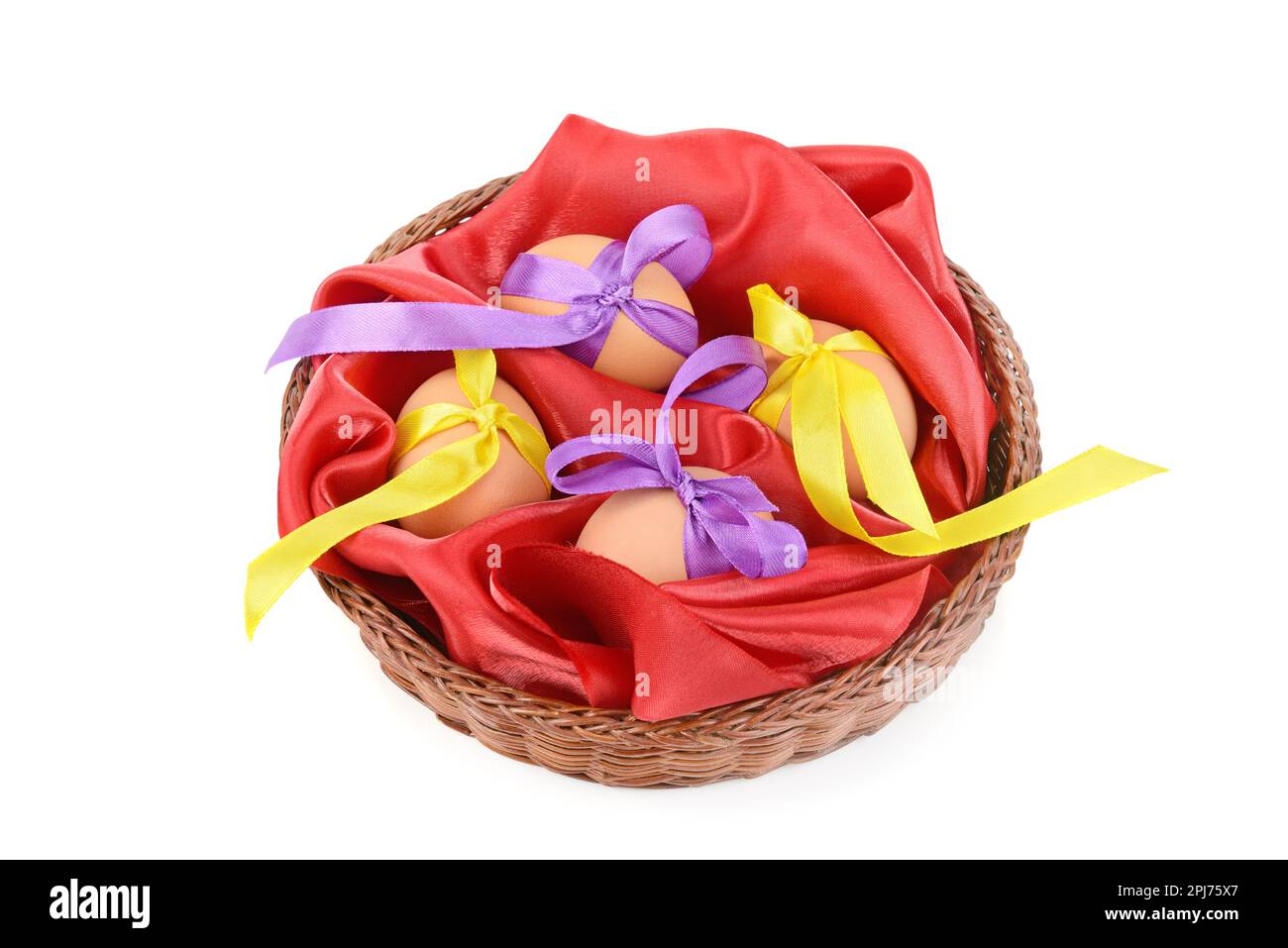 Easter eggs in a wicker basket isolated on white background Stock Photo ...