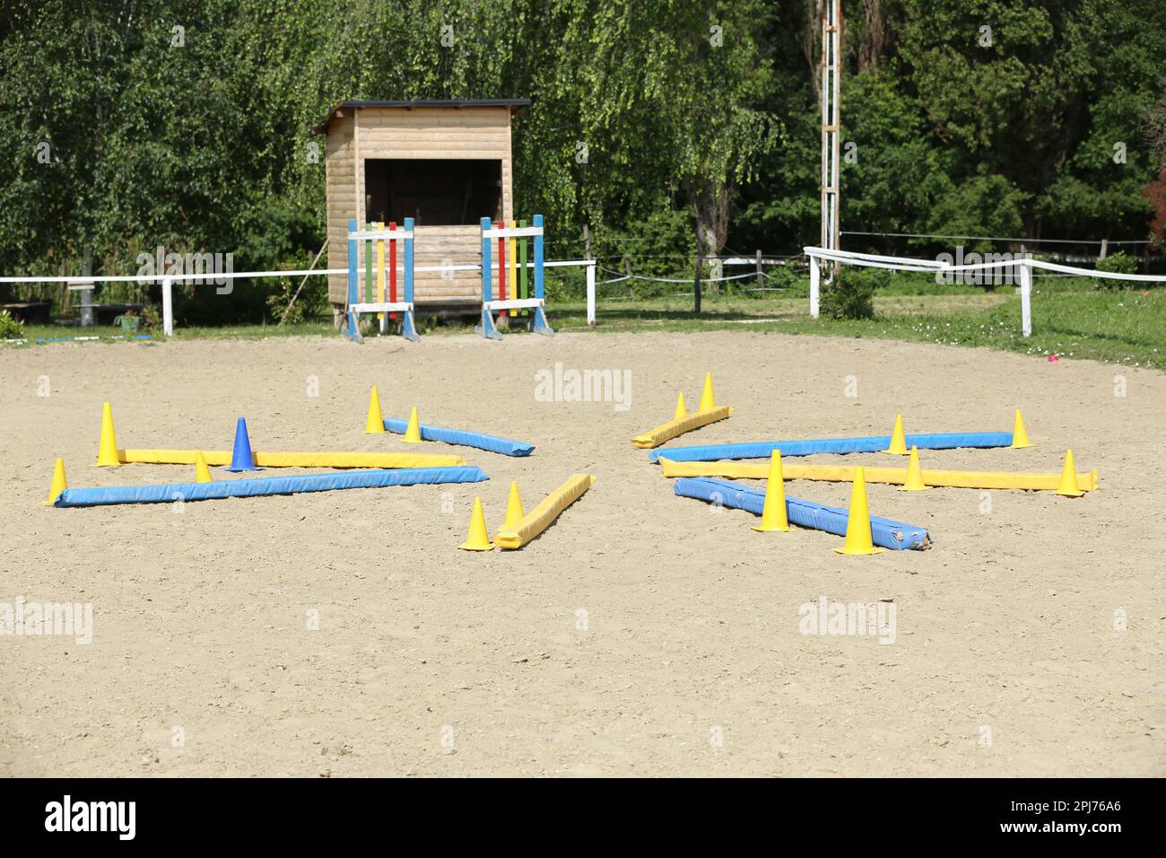 Show jumping poles obstacles, barriers, waiting for riders on show