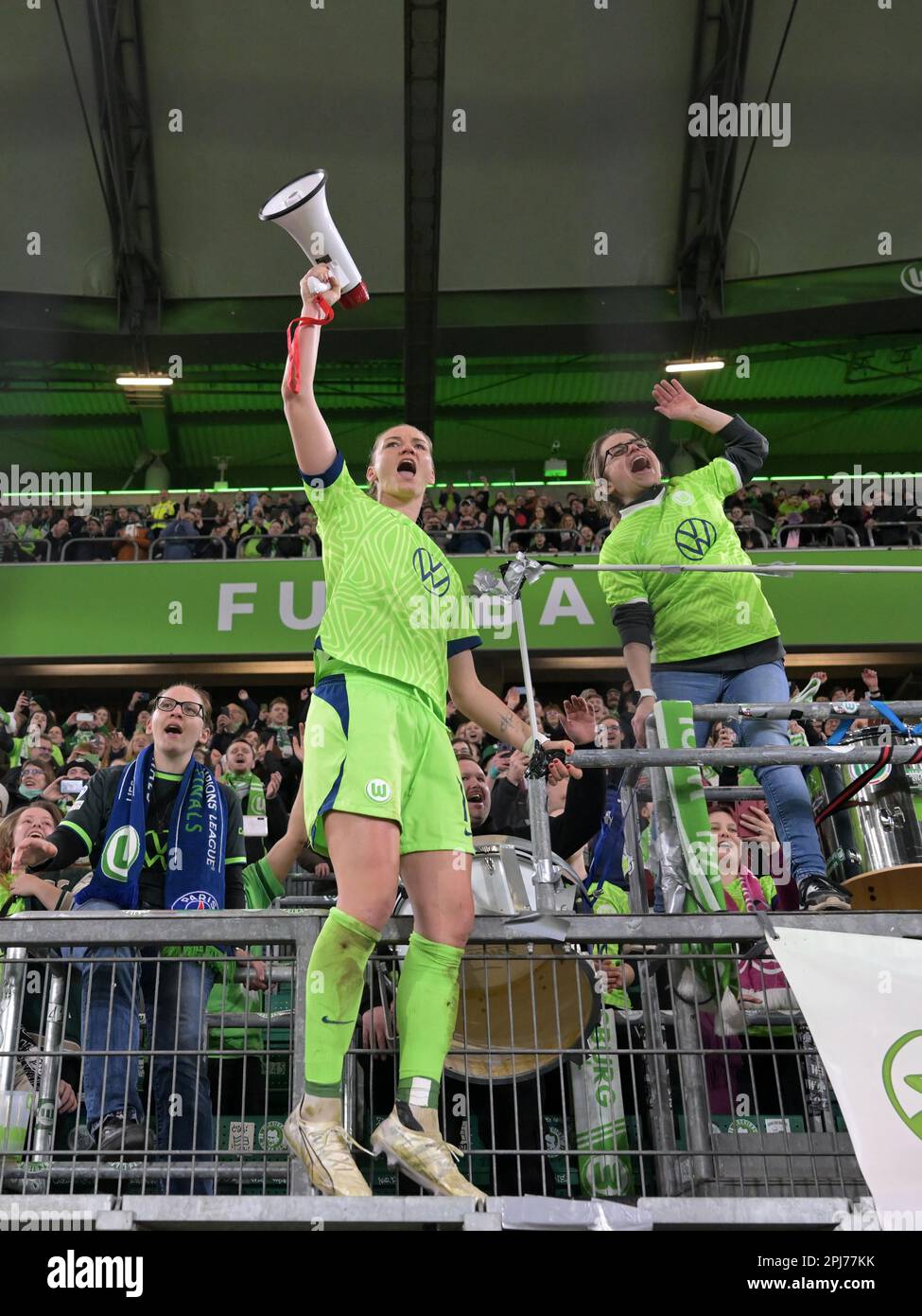WOLFSBURG - Alexandra Popp of VFL Wolfsburg women celebrates victory with the supporters during the UEFA Champions League quarterfinal match for women between VFL Wolfsburg and Paris Saint Germain at the VFL Wolfsburg Arena on March 30, 2023 in Wolfsburg, Germany. AP | Dutch Height | Gerrit van Cologne Stock Photo