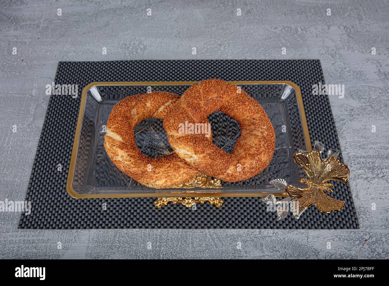Simit or gevrek, traditional Turkish pastry food on the wooden ...