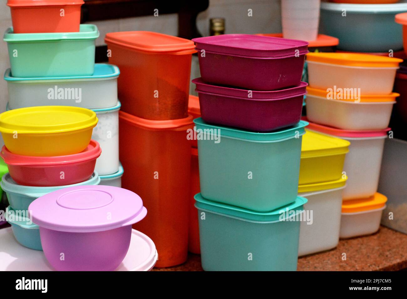 https://c8.alamy.com/comp/2PJ7CM5/cairo-egypt-february-4-2021-pile-of-several-and-many-tupperware-plastic-products-tupperware-corporation-an-american-multinational-company-produce-2PJ7CM5.jpg
