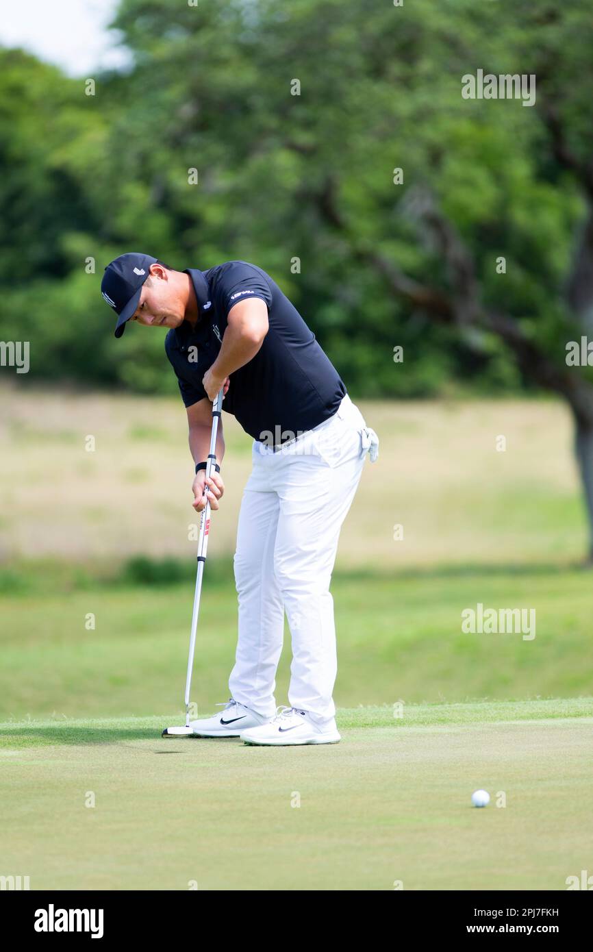 Danny Lee of Iron Heads GC putts during the first round of LIV Golf