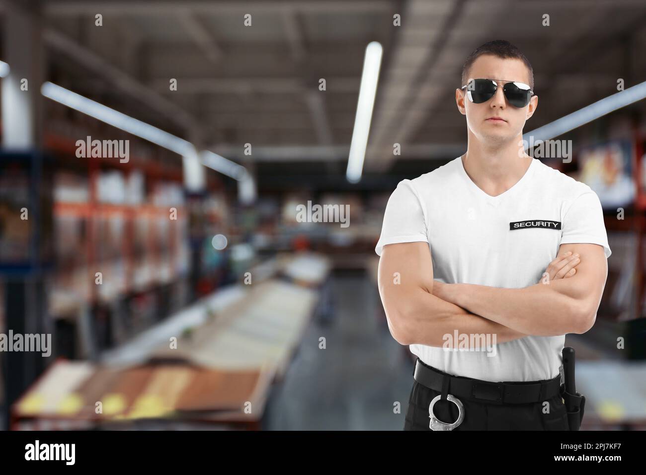 Male security guard wearing uniform in shopping mall Stock Photo Alamy