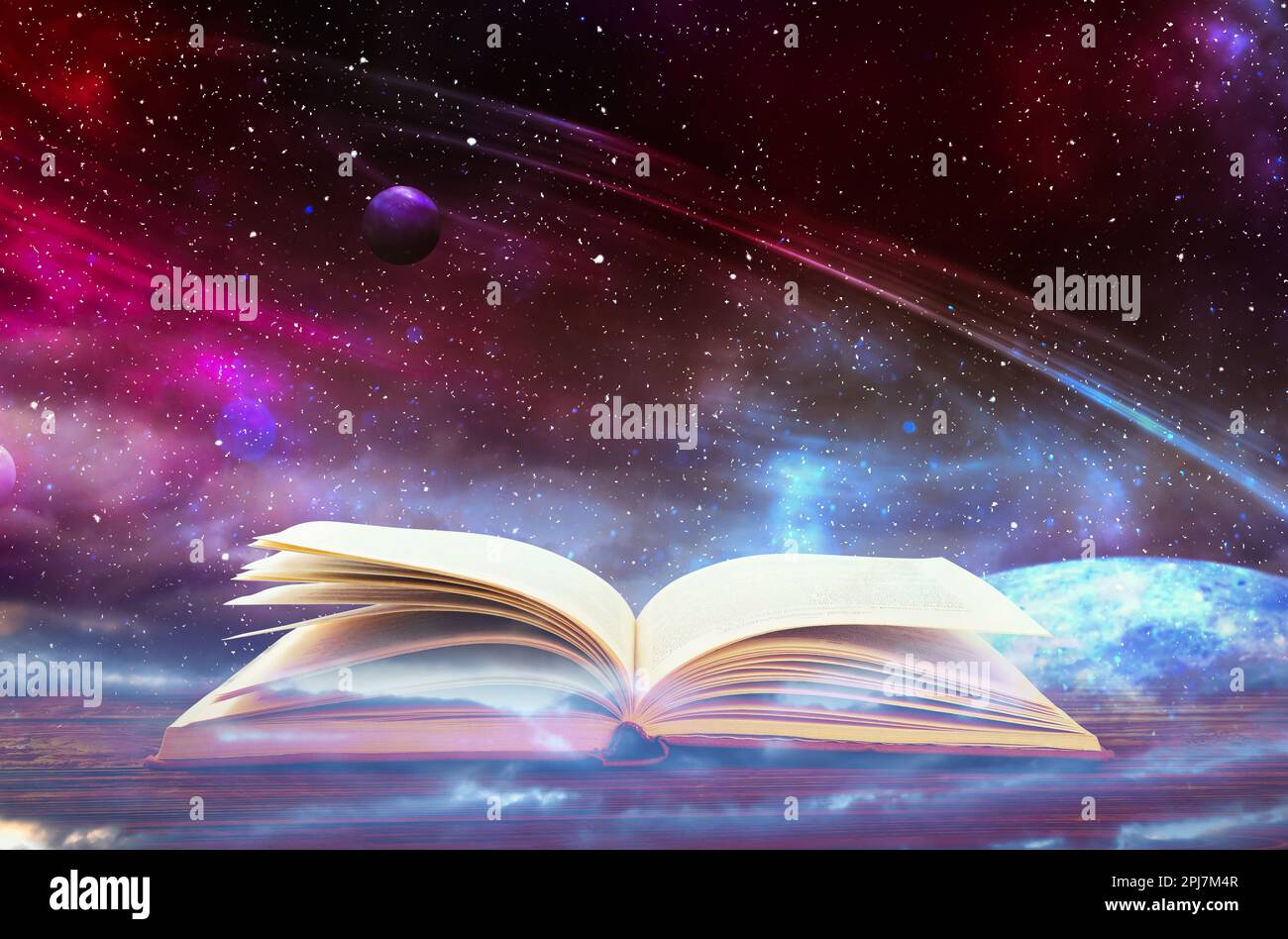 Wooden table with open book and beautiful universe on background Stock
